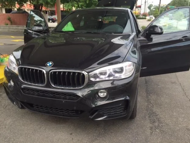 BMW X6 front view with doors open